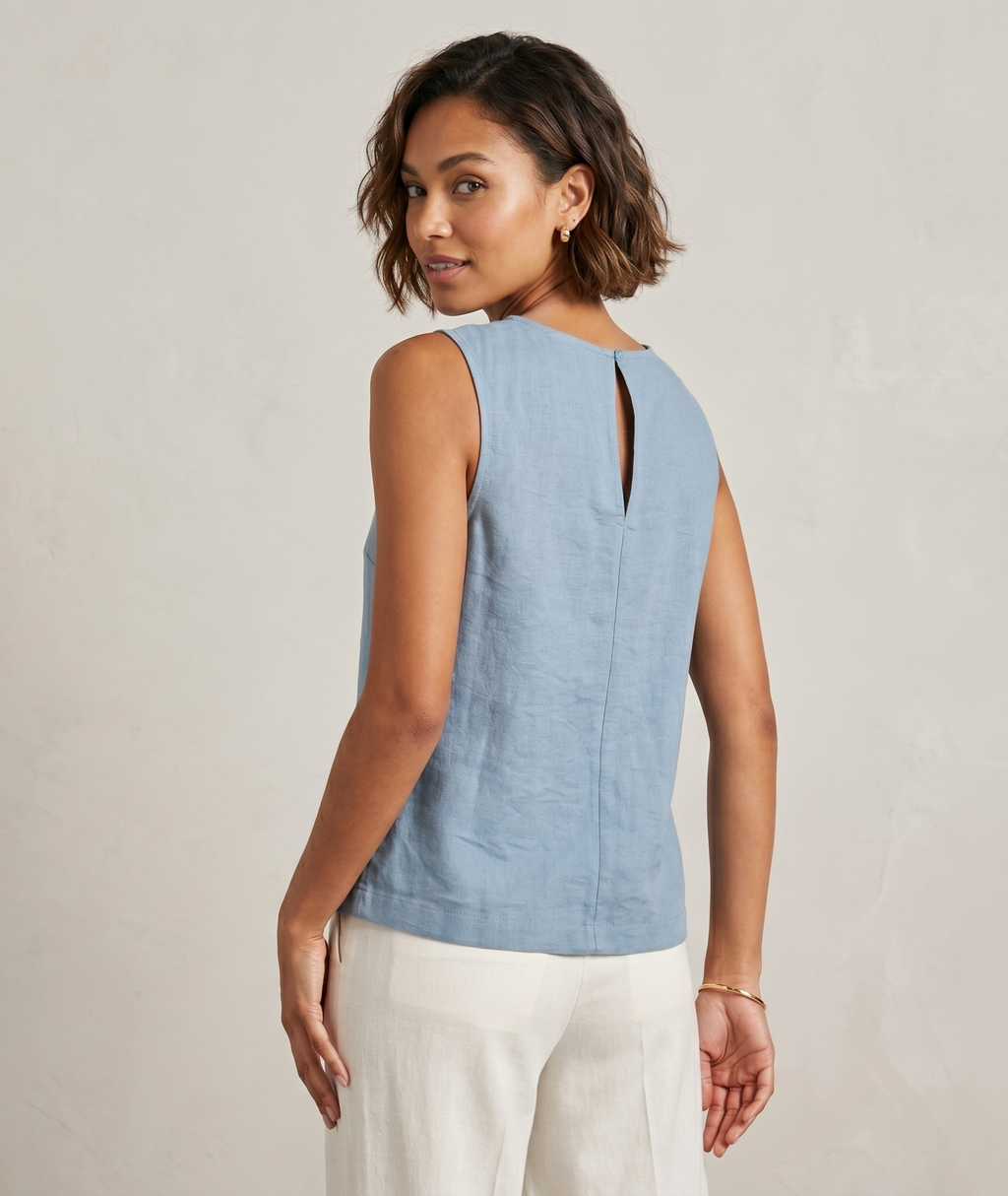 Blusa con aberturas sin mangas