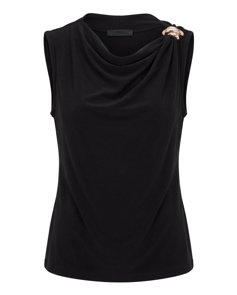 Blusa con broche en el hombro