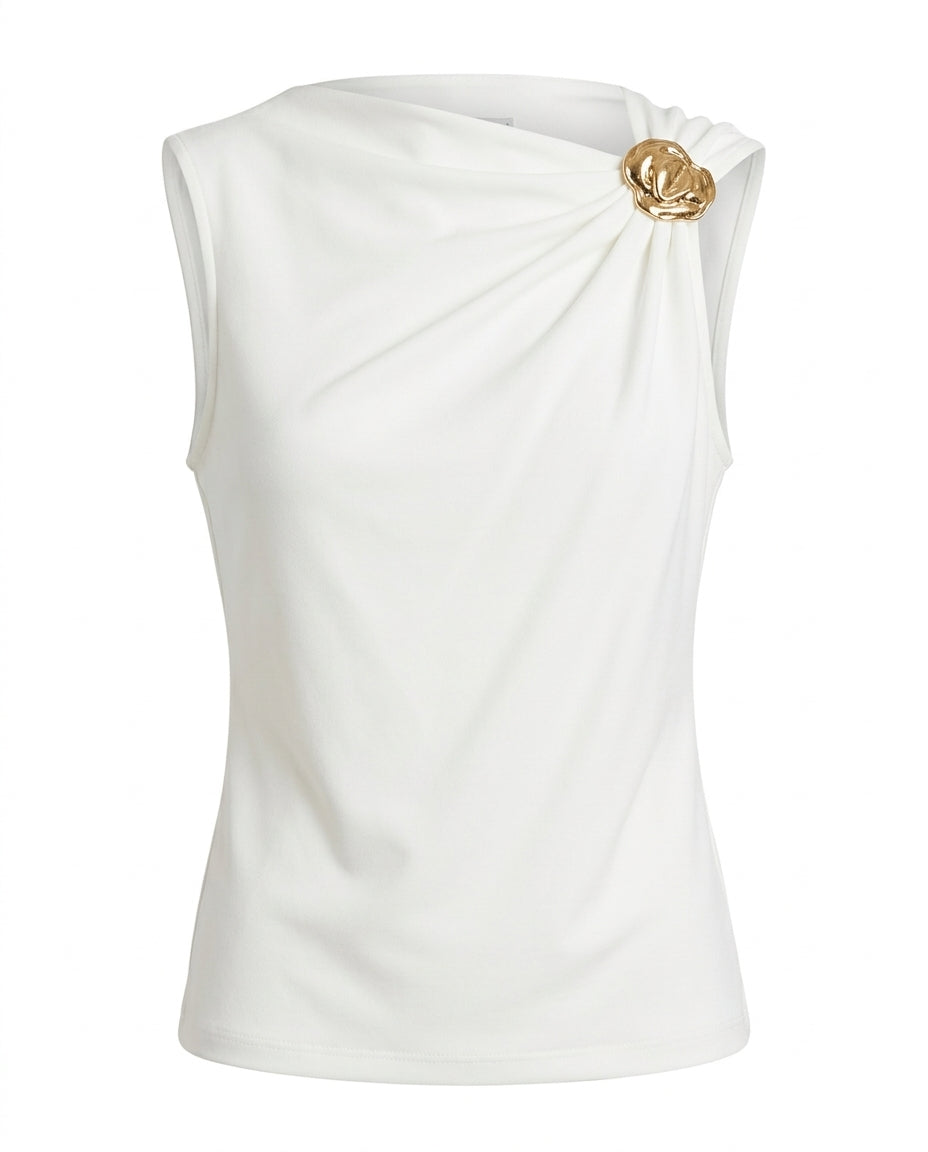 Blusa con broche en el hombro